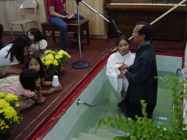 Baptism ceremony in the water