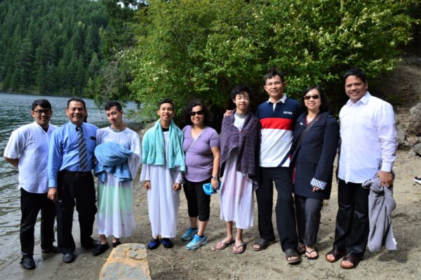 Baptism candidates with their families