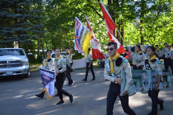 Vancouver Rangerz marching with flags and their club banner