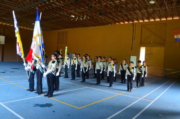 Pathfinders standing at attention during a march demonstration