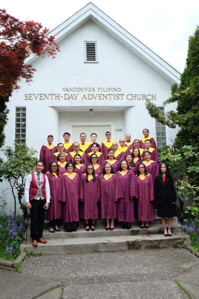 Entire choir team standing outside the VanFil Church