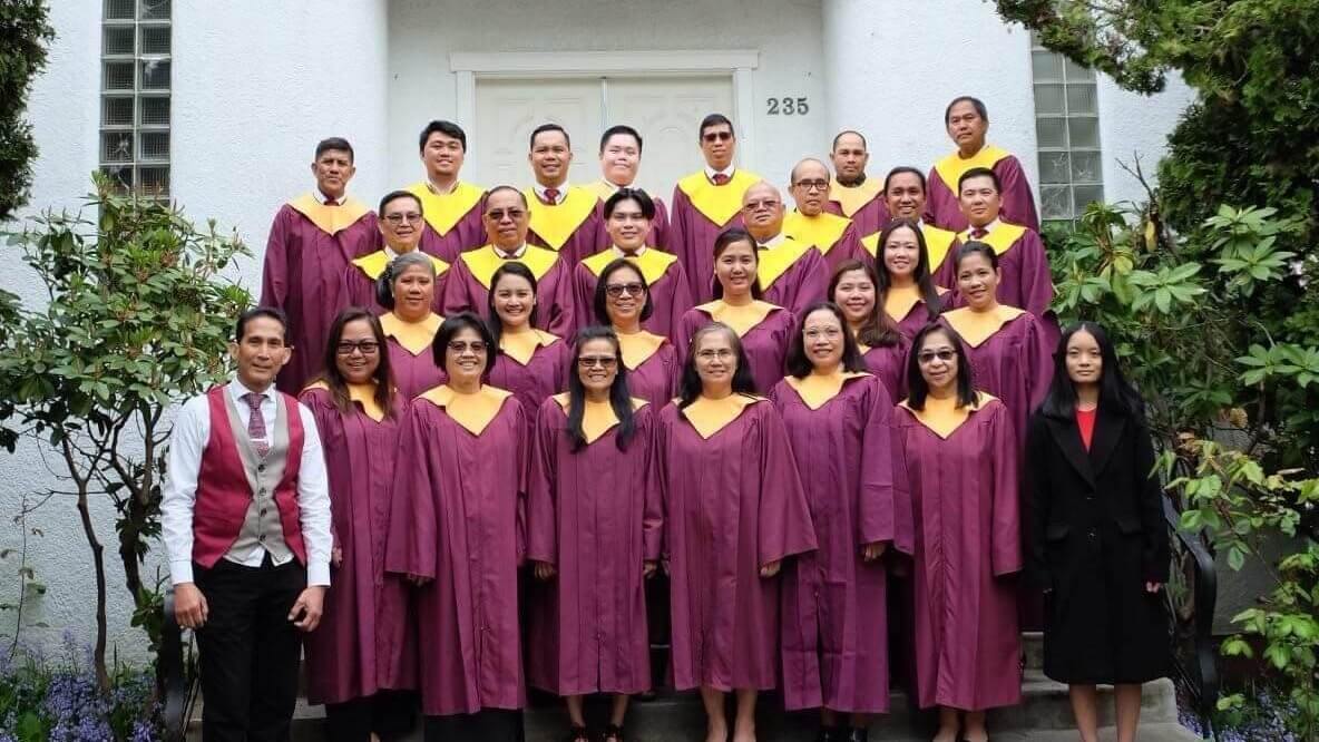 Entire choir team standing outside the VanFil Church