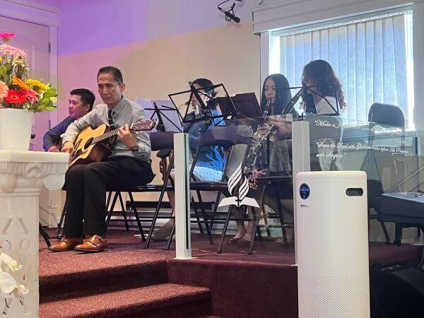 Ensemble members playing during church service