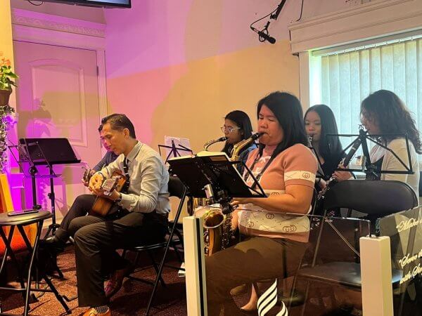 Ensemble team playing music during the church service