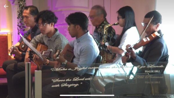 Ensemble team playing music during the church service