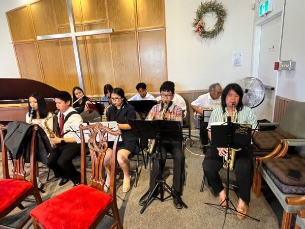 Ensemble team playing music during the church service